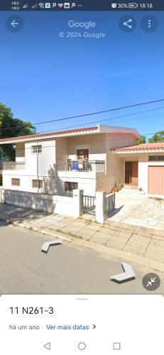 a screenshot of a picture of a house at Casa da Estação in Sines