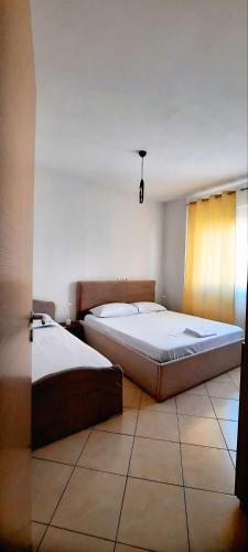Llit o llits en una habitació de C'e Casa Residence
