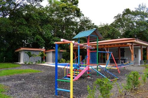 a playground in front of a house at Casa Cristal # 1 in Fortuna