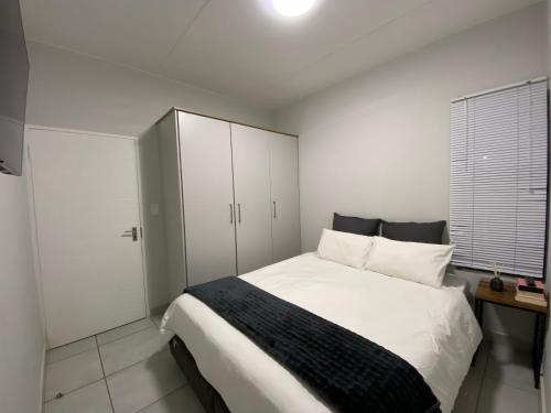 Ένα ή περισσότερα κρεβάτια σε δωμάτιο στο Elegant escape