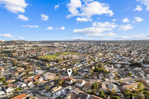 an aerial view of a city with houses at Mira Mesa Family Retreat 4BR with Balcony and Firepit in San Diego
