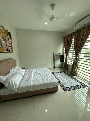 Кровать или кровати в номере Papena Homestay