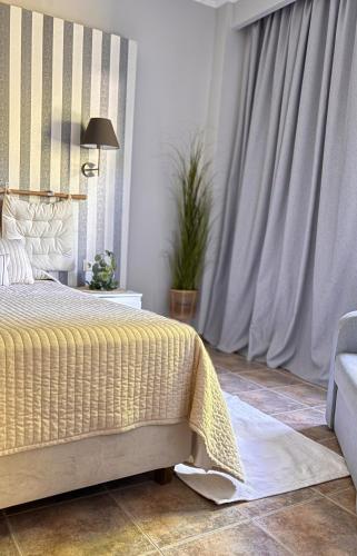 Kaloudis Studios & Apartmentsにあるベッド