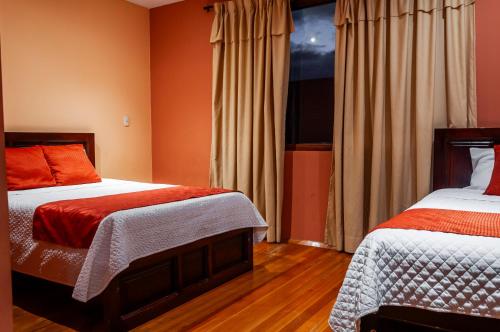 Ένα ή περισσότερα κρεβάτια σε δωμάτιο στο Hotel Calle Angosta