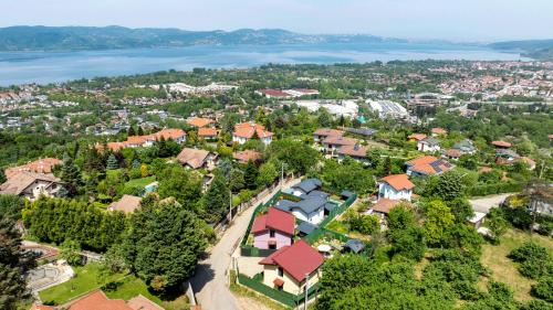 an aerial view of a residential neighborhood with a lake at Rubin Sapanca in Sapanca