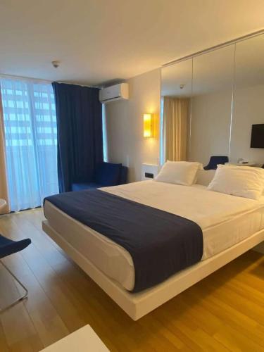 Postel nebo postele na pokoji v ubytování Lux Apart Hotel 555