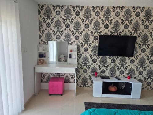 Una cocina o cocineta en Apartman IN