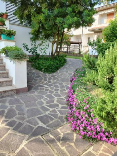 Κήπος έξω από το B & B Le Mimose