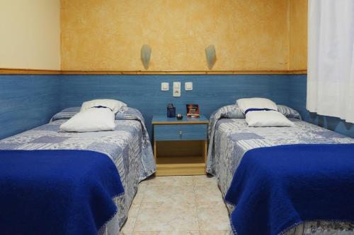 Postel nebo postele na pokoji v ubytování Hostal El Cartero