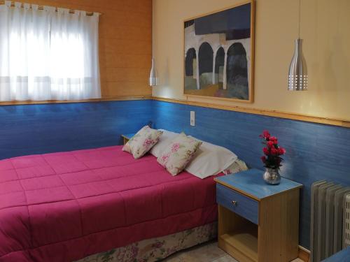Postel nebo postele na pokoji v ubytování Hostal El Cartero