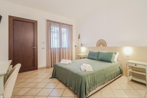 Letto o letti in una camera di Mediterranea Residence