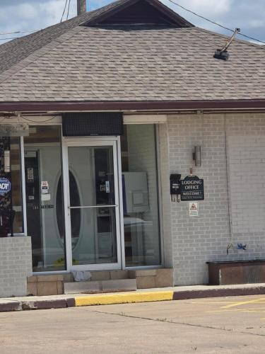 a building with a sign on the front of it at Stardust inn in El Dorado