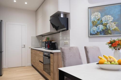 Η κουζίνα ή μικρή κουζίνα στο MK Luxury Serviced Apartments # 1