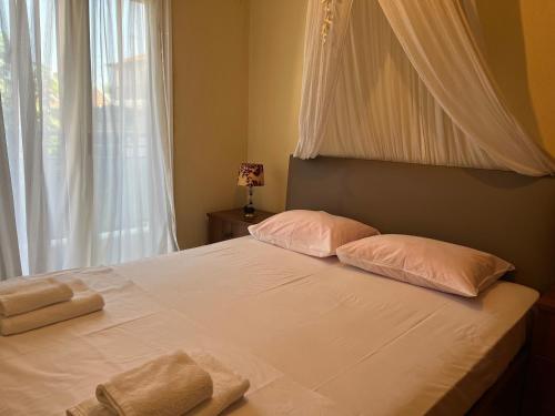 Una cama o camas en una habitación de Sidis home flogita