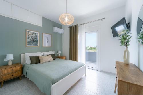 A bed or beds in a room at Villa Giota Luxury Living