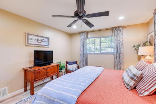 a bedroom with a bed and a flat screen tv at 3 Mi to Golf and Wineries Arroyo Grande Home! in Arroyo Grande