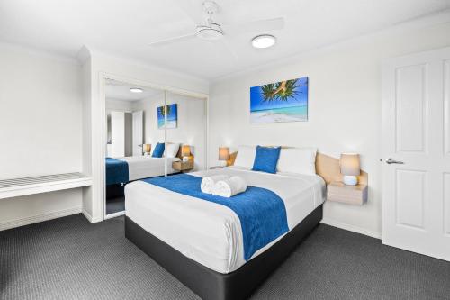 Belaire Place Motel Apartmentsにあるベッド