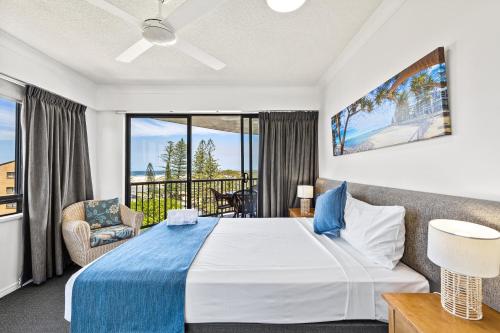 Belaire Place Motel Apartmentsにあるベッド