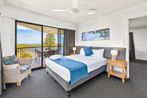Belaire Place Motel Apartmentsにあるベッド