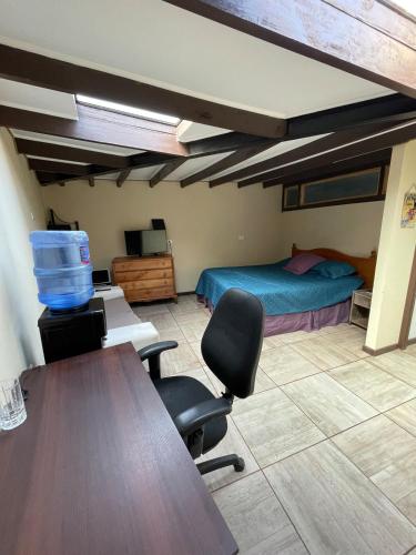 Posezení v ubytování Loft en Quintero