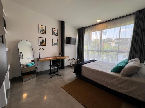 Postel nebo postele na pokoji v ubytování Baum Loft San Fernando 402
