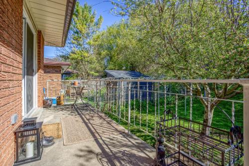 a wrought iron fence in front of a yard at Bright & Modern 1 bedroom unit! in Guelph