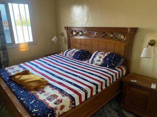 Ένα ή περισσότερα κρεβάτια σε δωμάτιο στο Nice apartment in Tambacounda