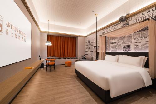 Postel nebo postele na pokoji v ubytování Arthur Hotel Liwan COCO Park Guangzhou-24H Coffee&Low Tea & Free Shuttle Bus For Canton Fair By Paco Group