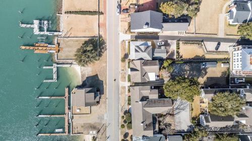 an aerial view of houses next to the water at Condo on Front condo in Beaufort