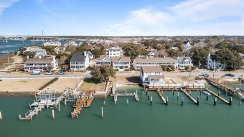 an aerial view of a harbor with houses and a dock at Condo on Front condo in Beaufort