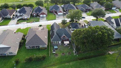 an aerial view of a residential neighborhood with houses at Golf-Side Luxe Escape Sleeps 13 Hot Tub & Theater in Port Arthur