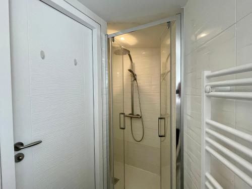 a shower in a bathroom with a glass door at Maison rénovée, loft artiste, Brem Sur Mer, 3 pers, WIFI - FR-1-231-336 in Brétignolles-sur-Mer
