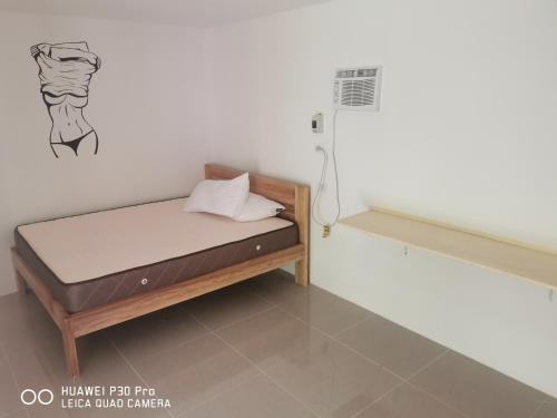 Postel nebo postele na pokoji v ubytování Jungle