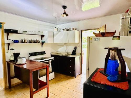 Kuchyň nebo kuchyňský kout v ubytování Casa de Campo en Rivas de Pérez Zeledon