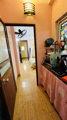 a room with a table with a sewing machine on it at Studio Kéo lưới in Hanoi