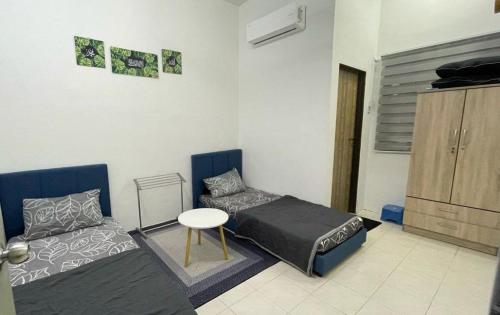 Ruang duduk di Sofea Homestay Tanjong Malim