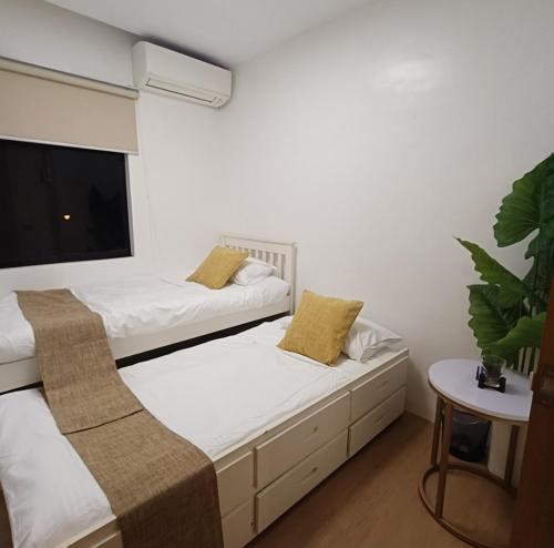 Ένα ή περισσότερα κρεβάτια σε δωμάτιο στο Villa Lorr by Antonio Homes