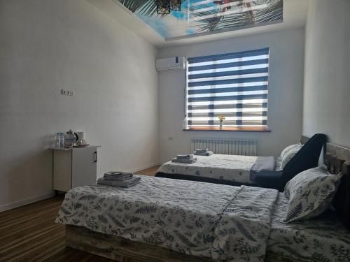Cama o camas de una habitación en well apartment