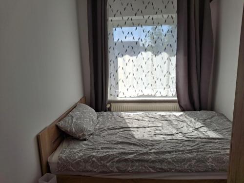 Postel nebo postele na pokoji v ubytování Ferienwohnung Mareike Schöning