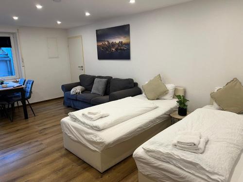 Ένα ή περισσότερα κρεβάτια σε δωμάτιο στο FÜR 3 - Boxspringbetten, Smart TV, Parkplatz, Stadion Nähe