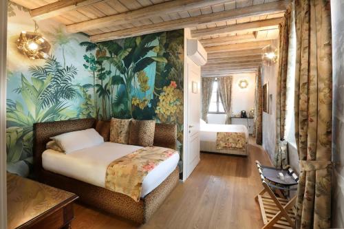 Postel nebo postele na pokoji v ubytování Suites&Atelier Lake Como