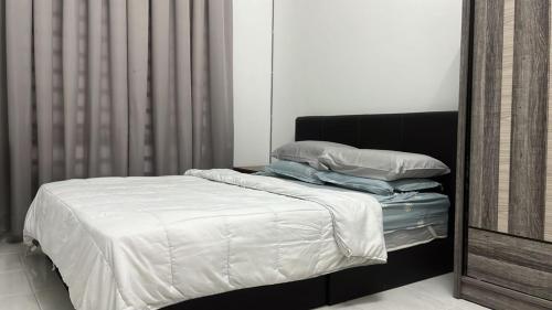 Postel nebo postele na pokoji v ubytování Homestay AZ