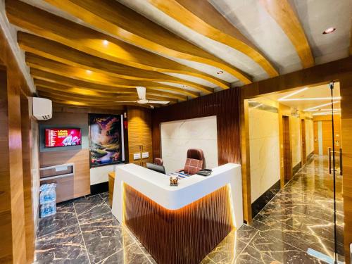 Μια τηλεόραση ή/και κέντρο ψυχαγωγίας στο hotel avenue gold