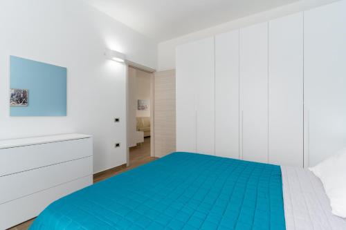 Postel nebo postele na pokoji v ubytování ApartHotel Capo Rizzuto