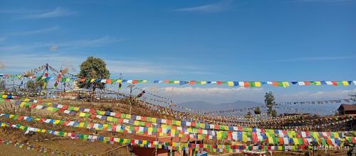 a long line of flags on a hill at Everest Home Stay Temal Kalimati Tower in Thapathali