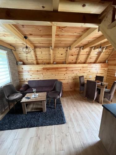 Posezení v ubytování Lake house- Jakov