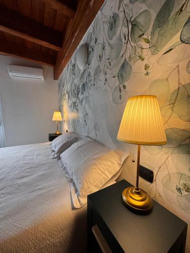 Letto o letti in una camera di Macrù Apartments