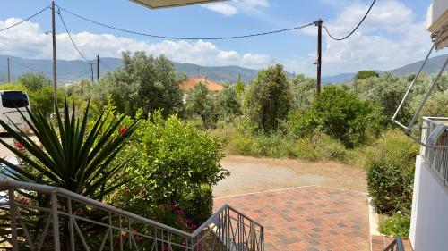 a view from the stairs of a house at Το Φιλόξενο Σπιτάκι! - The Friendly Nest ! in Paralion astros