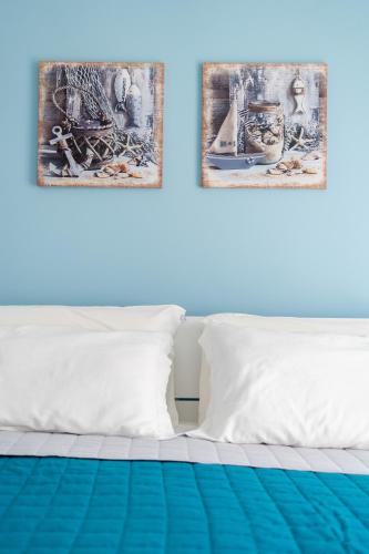 Postel nebo postele na pokoji v ubytování ApartHotel Capo Rizzuto