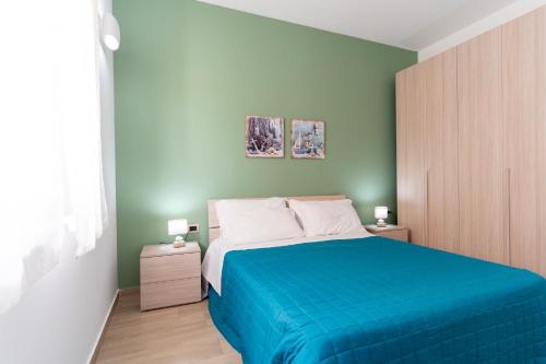 Postel nebo postele na pokoji v ubytování ApartHotel Capo Rizzuto